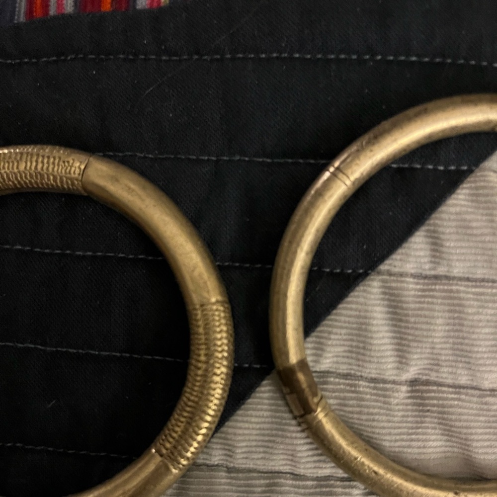 Two Antique African Money Circle Bracelets.